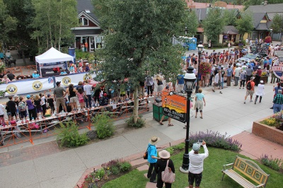 The USA Pro Cycling Challendge rolls along Main Street in front of Breckenridge Associates